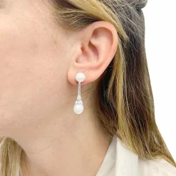 Boucles d'oreilles perles, diamants, platine, or blanc.
