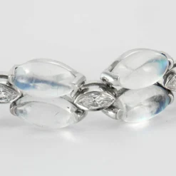 Boucles d'oreilles Pierre de lune Diamants et Saphirs
