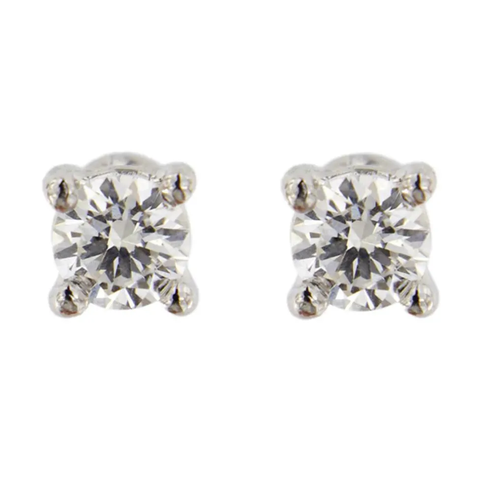 Boucles d'oreilles point lumineux avec diamants