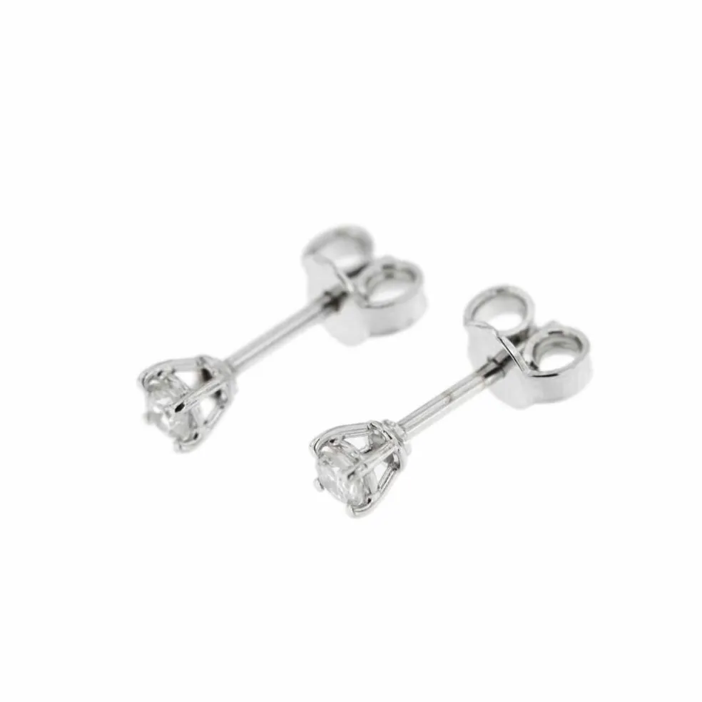 Boucles d'oreilles point lumineux avec diamants