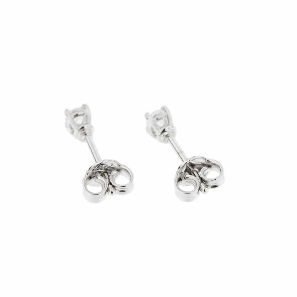 Boucles d'oreilles point lumineux avec diamants