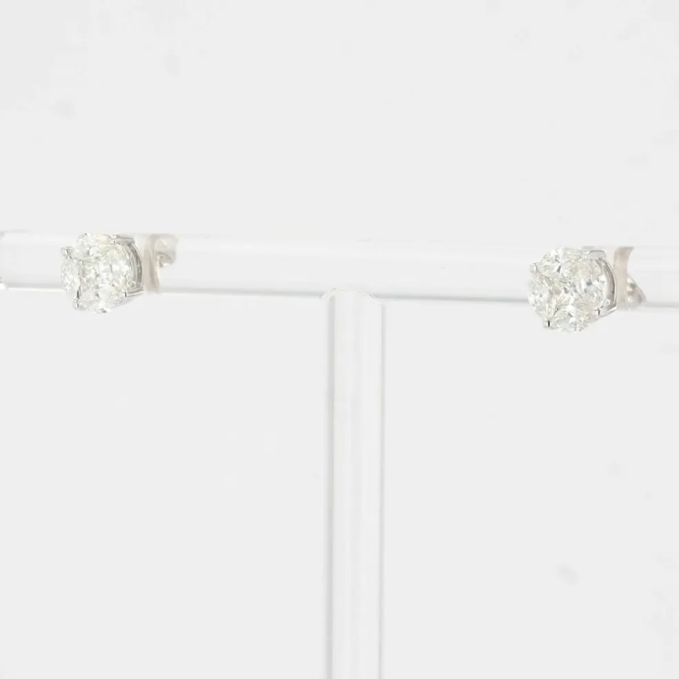 Boucles d'oreilles puces diamants 0.54 carat et or blanc