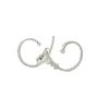 Boucles d'oreilles spirales en or blanc et diamants