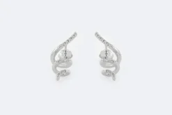 Boucles d'oreilles spirales en or blanc et diamants
