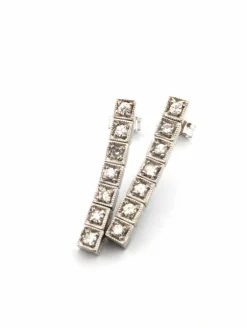 Boucles d'oreilles tennis en platine avec diamants