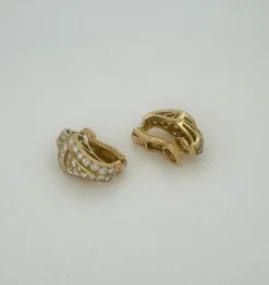 Boucles d'oreillesor jaune signées Wolfers