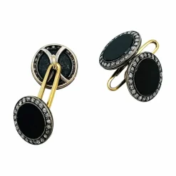 Boutons de manchette 1910 en or, argent, onyx et diamants.
