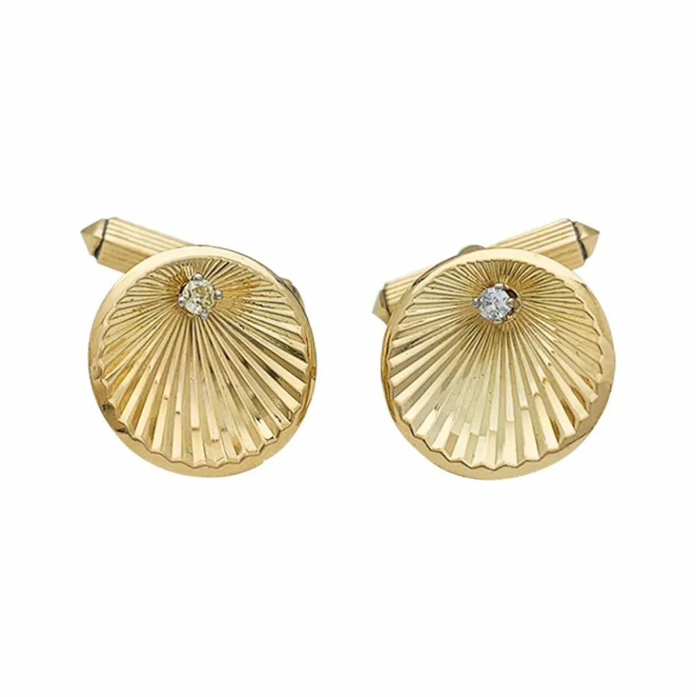 Boutons de manchette en or jaune et diamants.