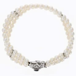 Bracelet 3 rangs de perles et son fermoir en or blanc