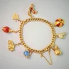 Bracelet ancien or jaune avec breloques