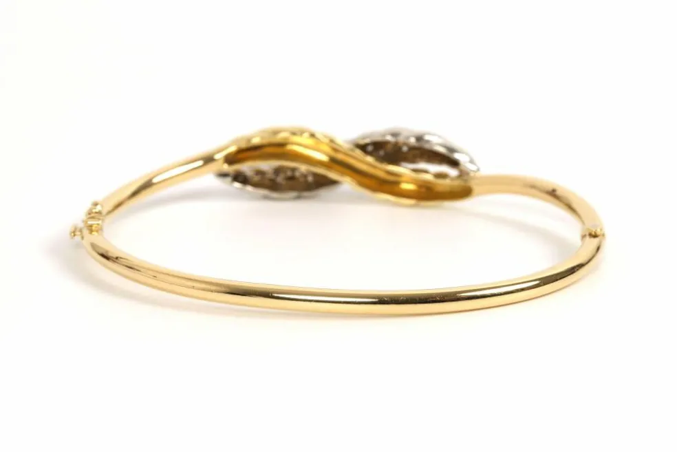 Bracelet Années 70 en or jaune et blanc 18 carats serti de diamants
