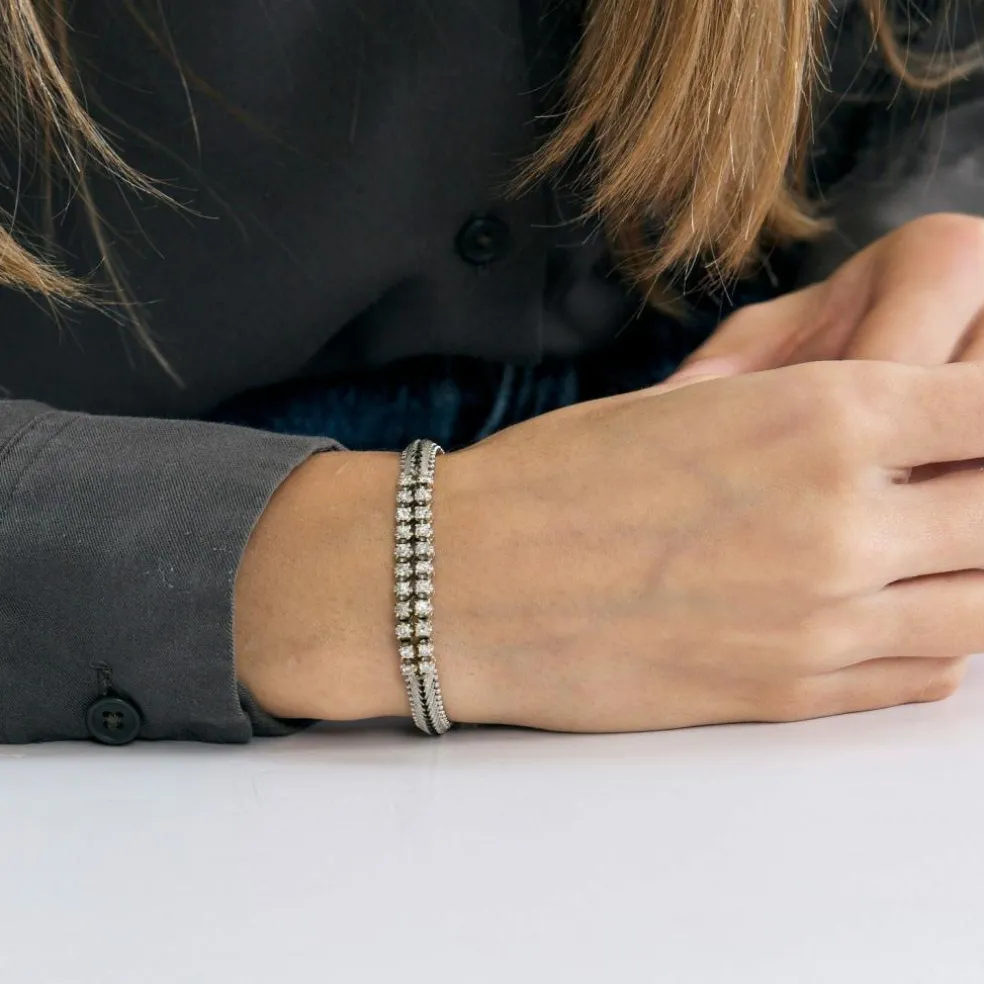 Bracelet années 60, or blanc et diamants