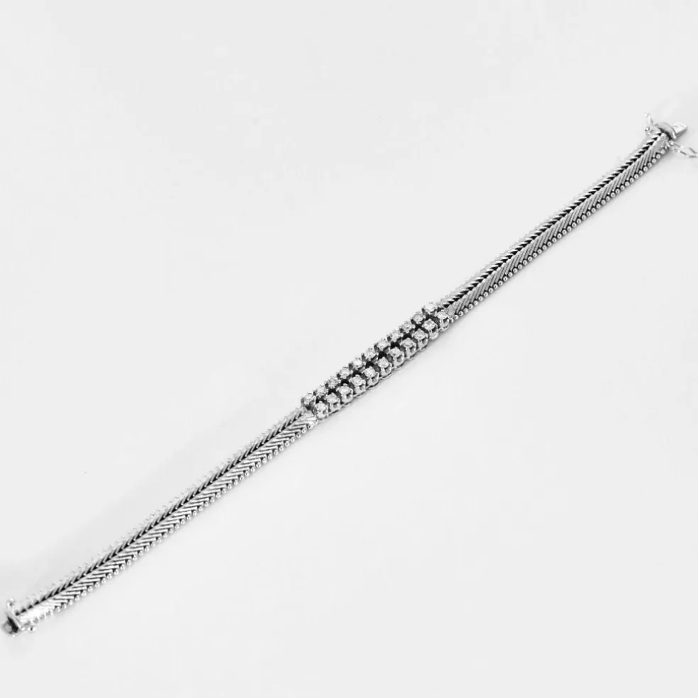 Bracelet années 60, or blanc et diamants