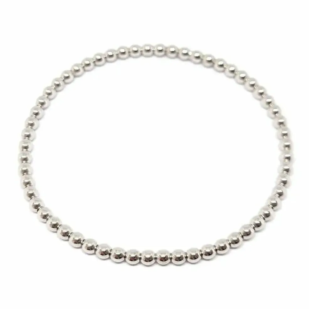 Bracelet boules or blanc