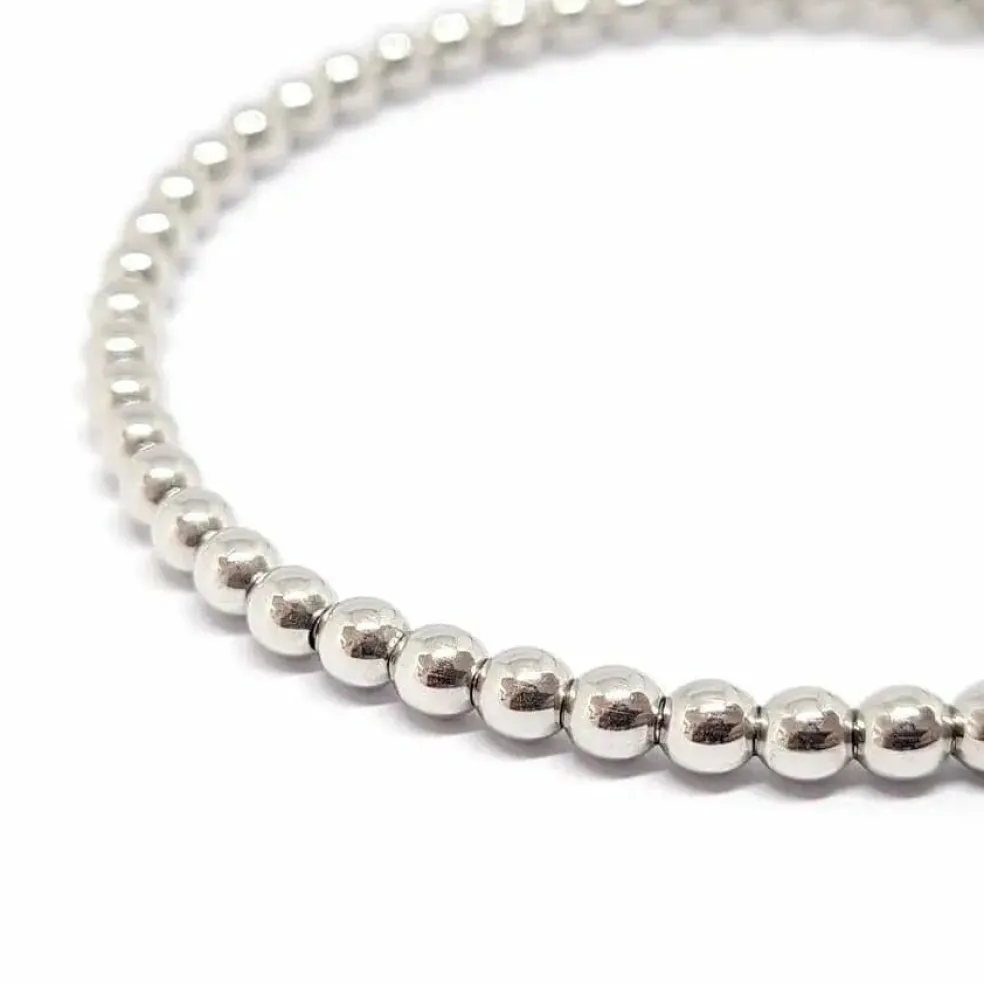 Bracelet boules or blanc