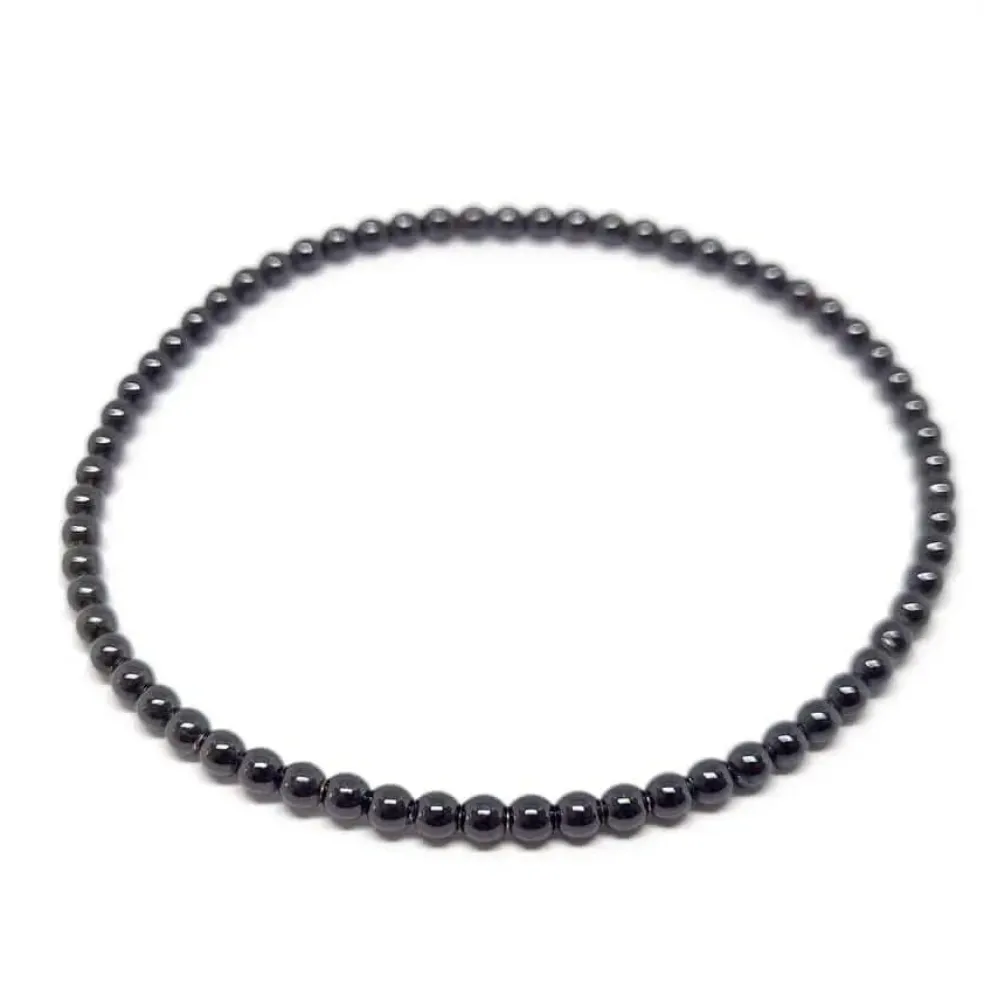 Bracelet boules or noir