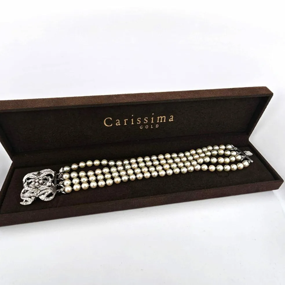 Bracelet de perles avec fermoir en or blanc massif et diamants