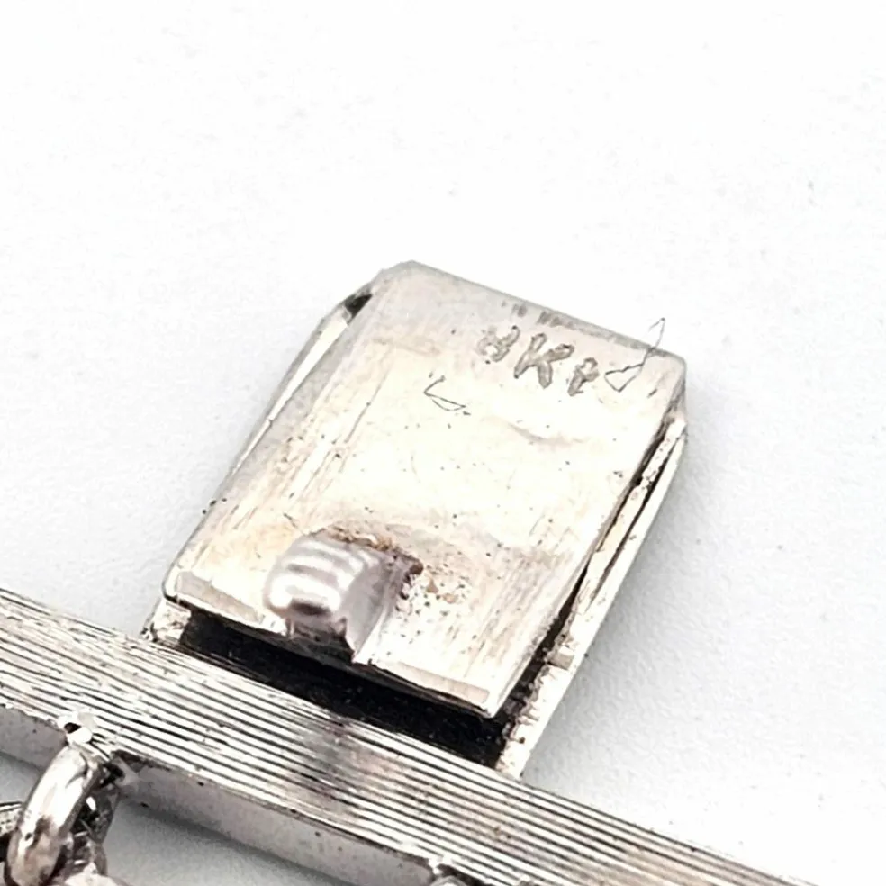 Bracelet de perles avec fermoir en or blanc massif et diamants