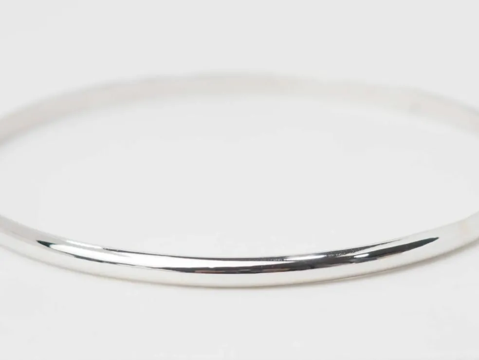 Bracelet demi jonc en or blanc