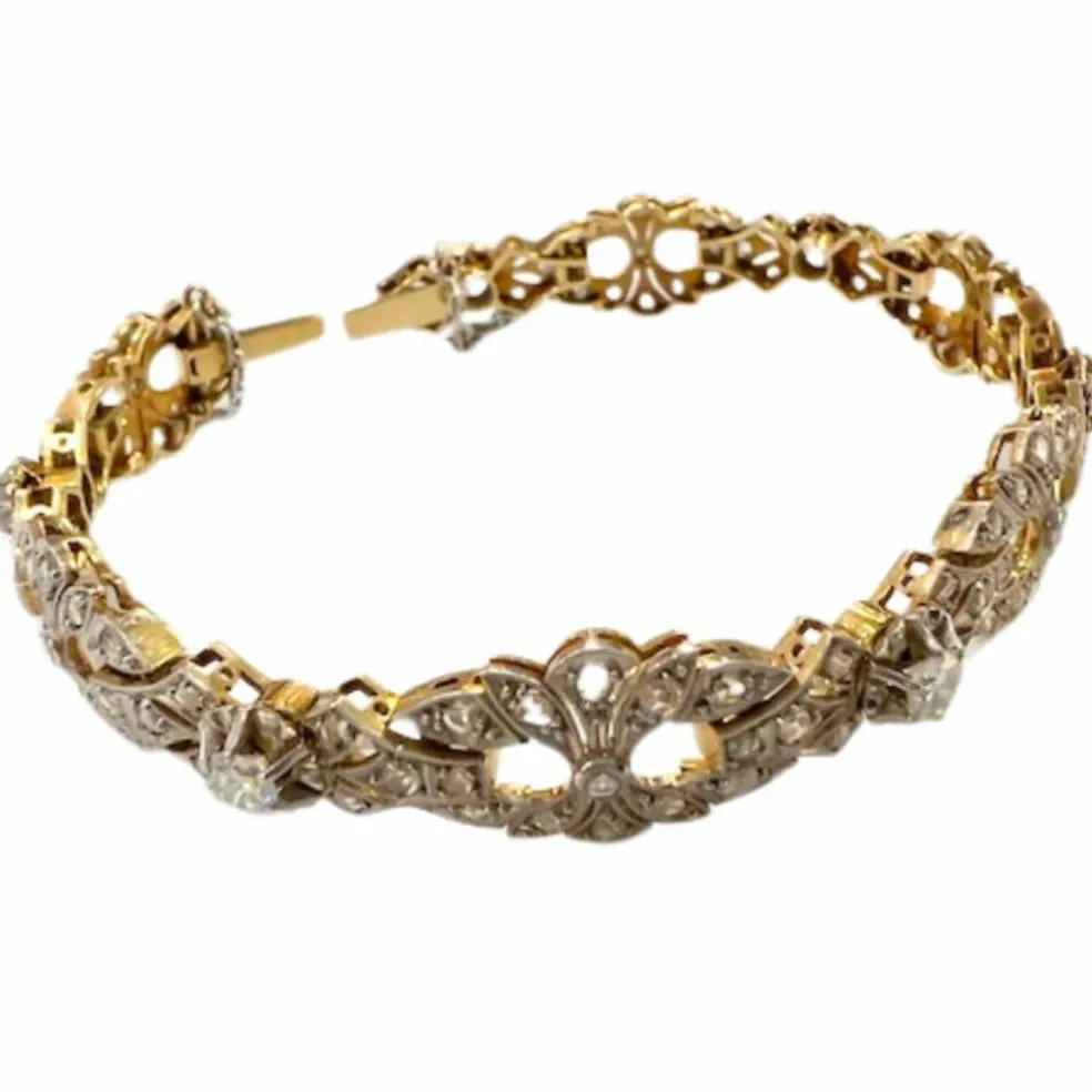 Bracelet design Art Déco en or jaune et platine avec diamants