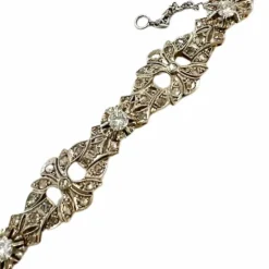 Bracelet design Art Déco en or jaune et platine avec diamants