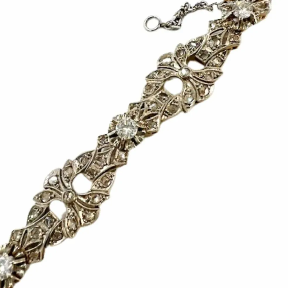 Bracelet design Art Déco en or jaune et platine avec diamants