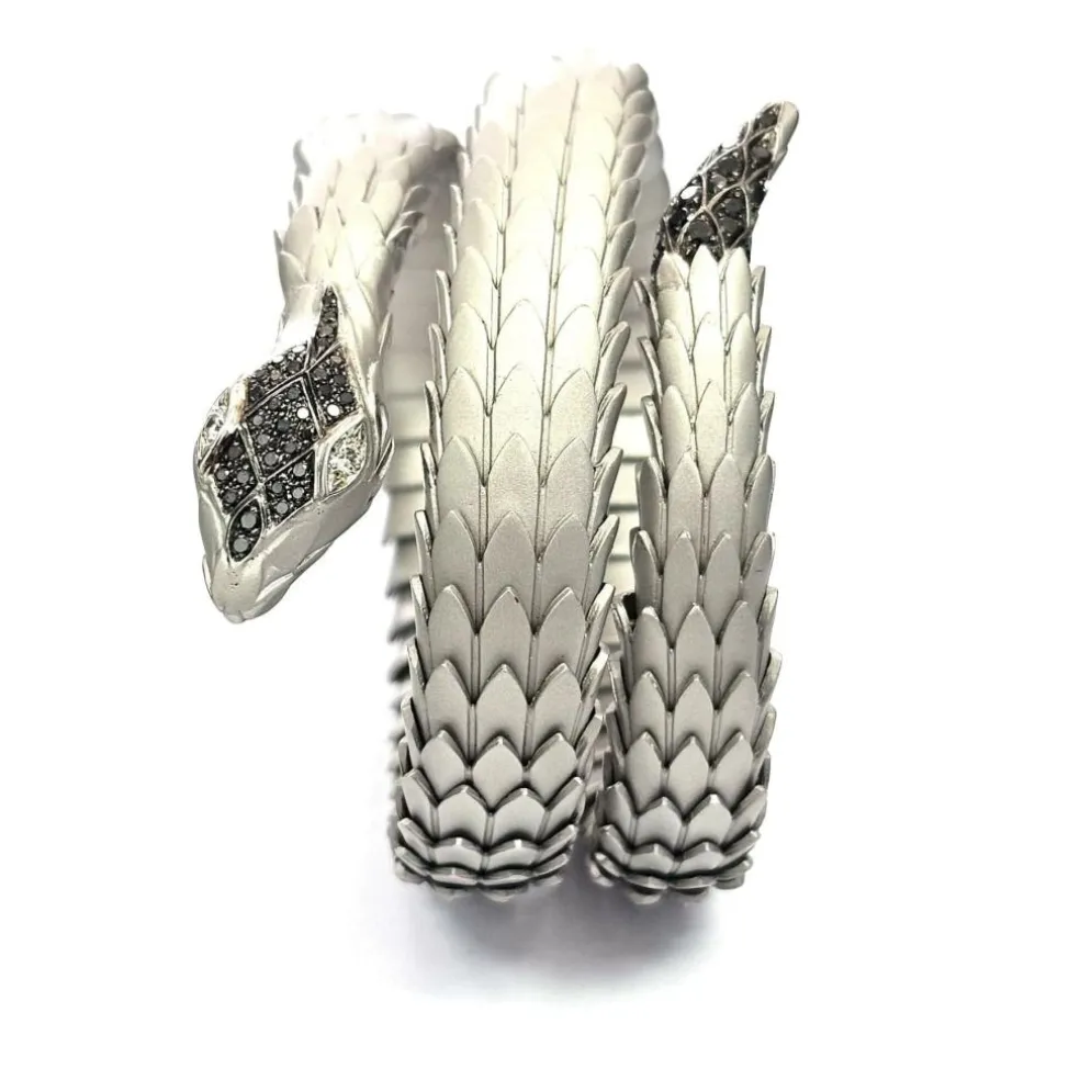 Bracelet en or blanc et argent avec diamants blancs et noirs