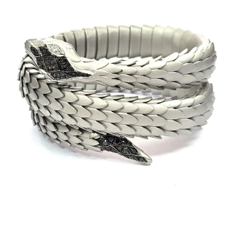 Bracelet en or blanc et argent avec diamants blancs et noirs