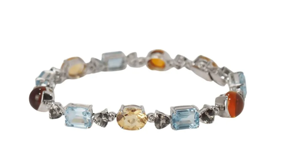 Bracelet en or blanc et pierres fines