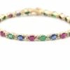 Bracelet en or jaune avec pierres précieuses