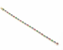 Bracelet en or jaune avec pierres précieuses