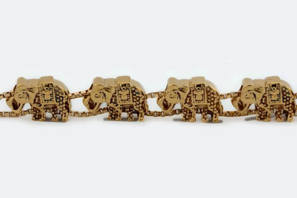 Bracelet en or jaune avec éléphants