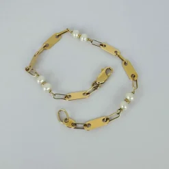 Bracelet en or jaune avec perles