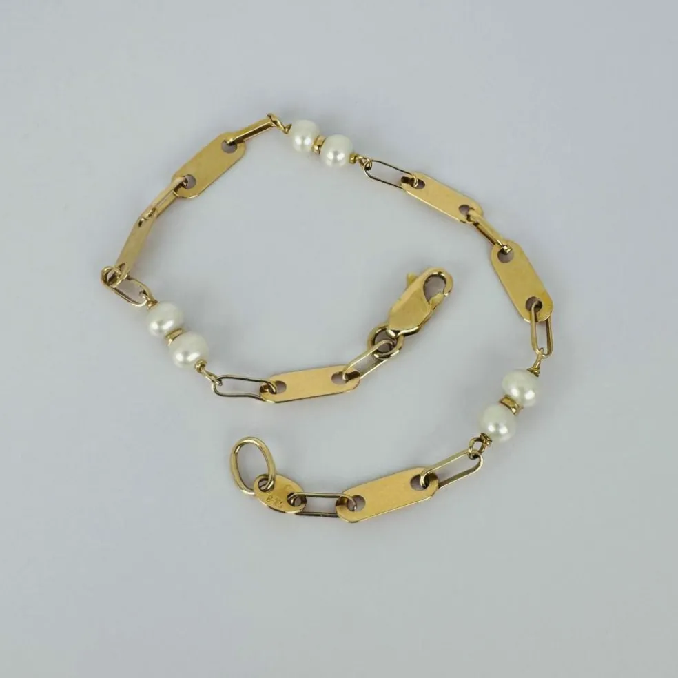 Bracelet en or jaune avec perles