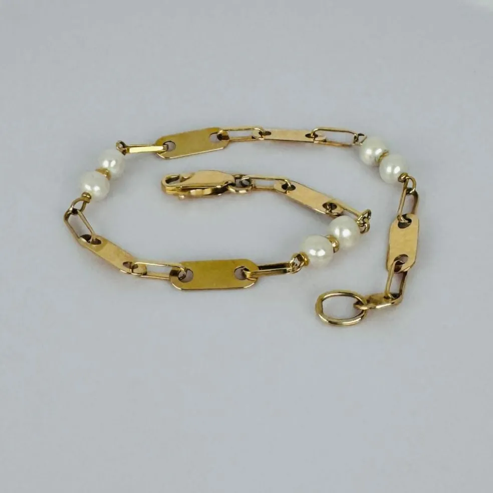 Bracelet en or jaune avec perles