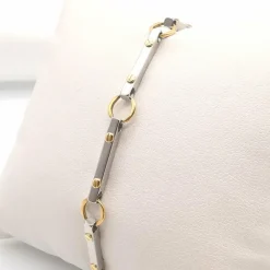 Bracelet en or jaune et acier