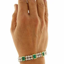 Bracelet en or jaune et blanc avec diamants et émeraudes