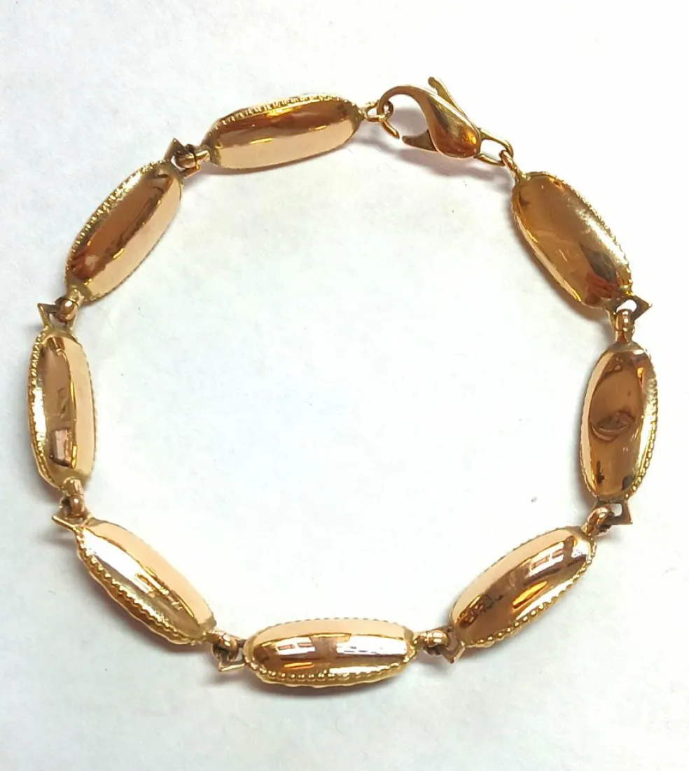 Bracelet en or jaune et grenats de Perpignan