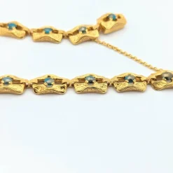 Bracelet en or jaune et turquoises