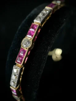 bracelet en or jaune 18K orné de rubis et brillants