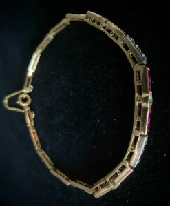 bracelet en or jaune 18K orné de rubis et brillants