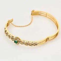 Bracelet en or jaune, émeraude et diamants