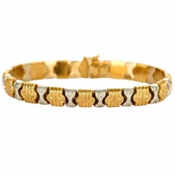 Bracelet en or jaune, or gris et diamants