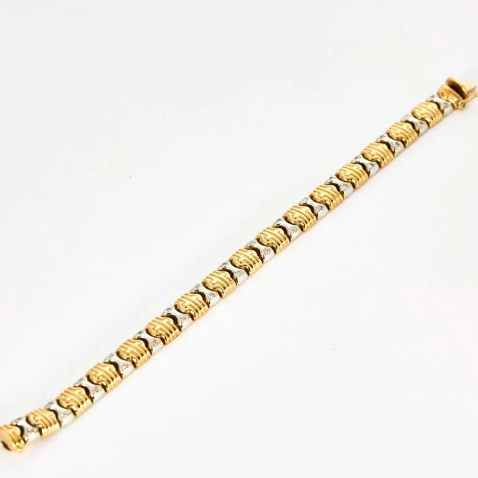 Bracelet en or jaune, or gris et diamants