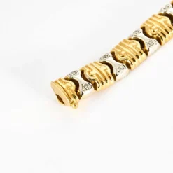Bracelet en or jaune, or gris et diamants