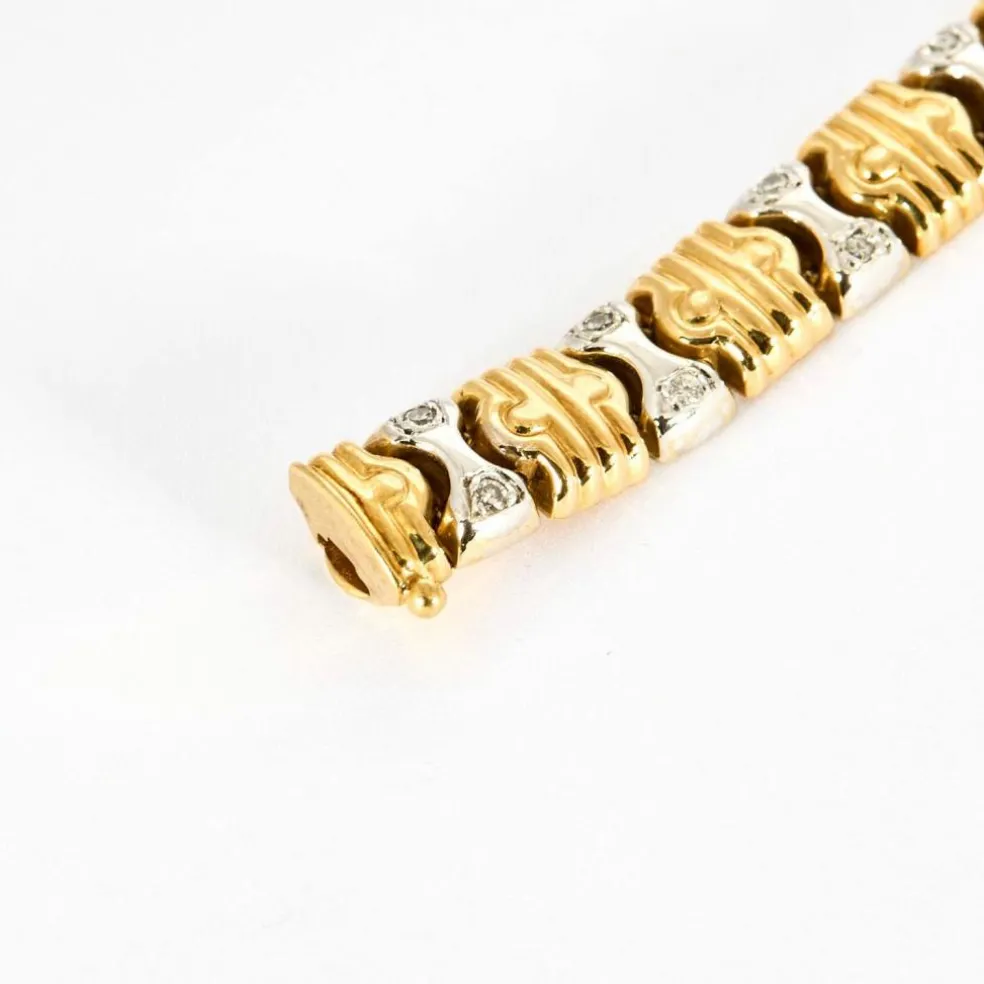 Bracelet en or jaune, or gris et diamants