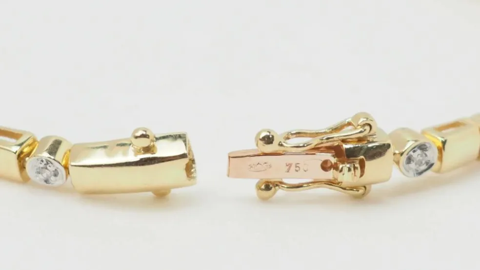 Bracelet en or jaune, rubis et diamants