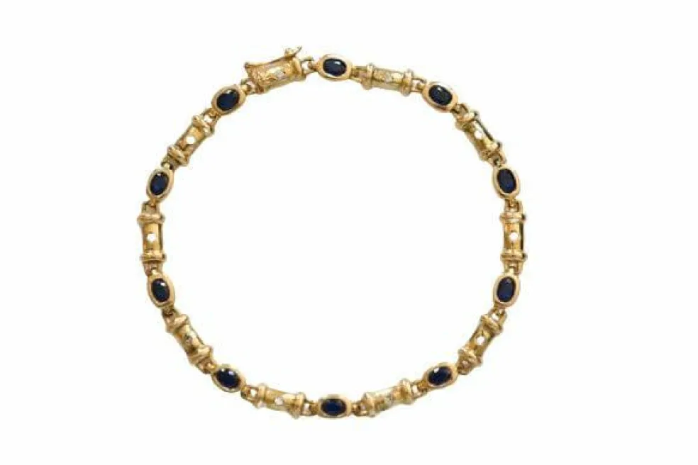 Bracelet En Or Orné De Diamants Et Saphirs