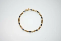 Bracelet En Or Orné De Diamants Et Saphirs