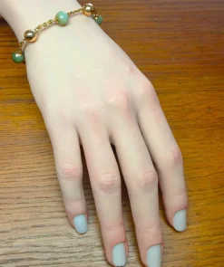 Bracelet en or rose et perles de jade